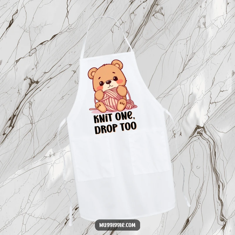Funny apron depicting a bewildered bear tangled in a ball of yarn, perfect for protecting clothes during crafting or cooking activities.