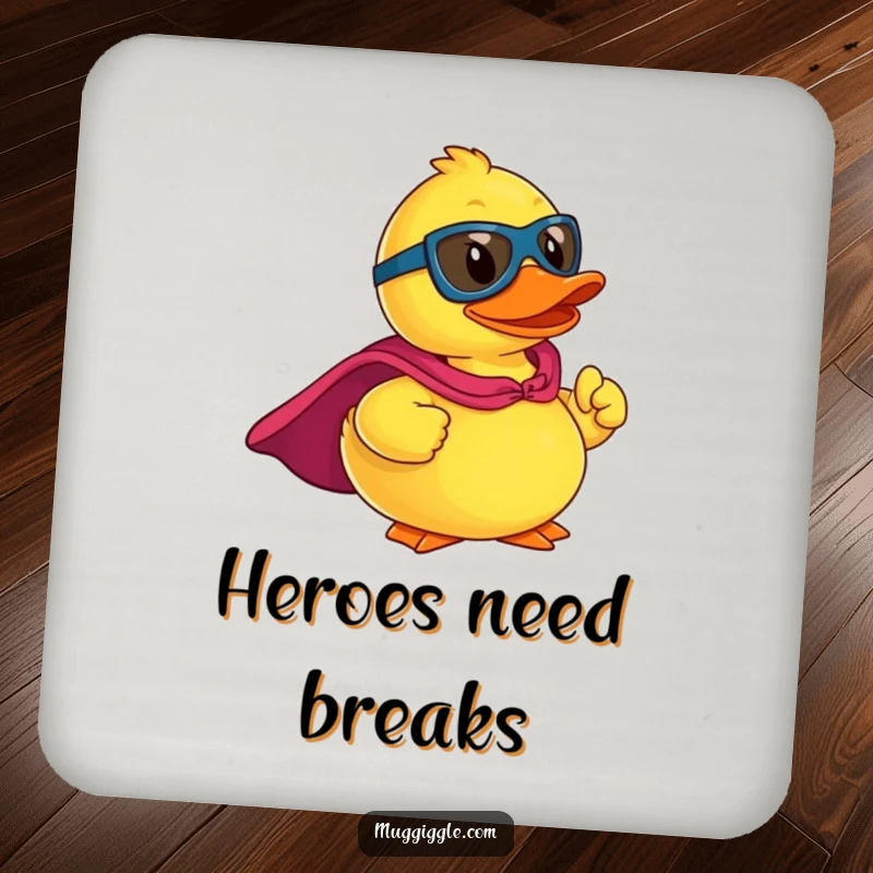 Funny drink coaster with a rubber ducky superhero in a cape, striking a heroic pose, protecting tables with humor.