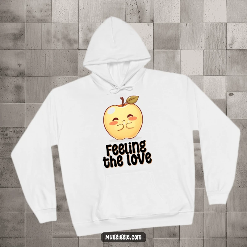 Funny Hoodie featuring a shyly blushing apple hugging a large, sparkly button, offering cozy comfort and endearing humor.