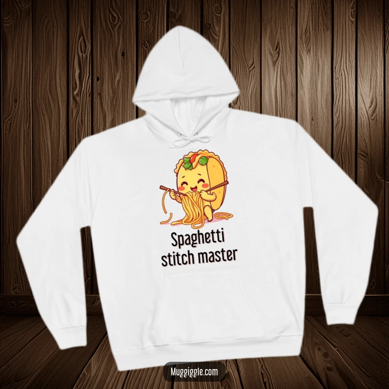 Funny Hoodie: A smiling taco character humorously knitting with spaghetti noodles, offering warmth and culinary comedy.