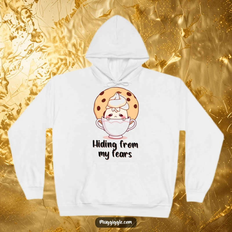 Funny hoodie featuring a nervous teacup character hiding behind a big cookie, offering a sense of cozy secrecy.