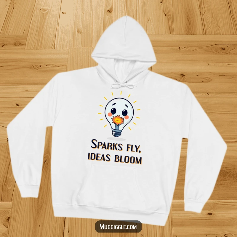 Funny Hoodie: A surprised lightbulb character is engulfed in a tiny, colorful explosion, representing a burst of inspiration.