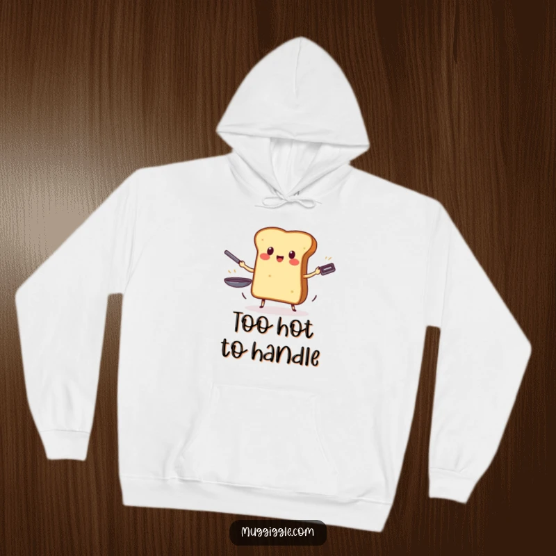 Funny hoodie depicting a valiant piece of toast skillfully juggling three hot frying pans, radiating confidence and humor.