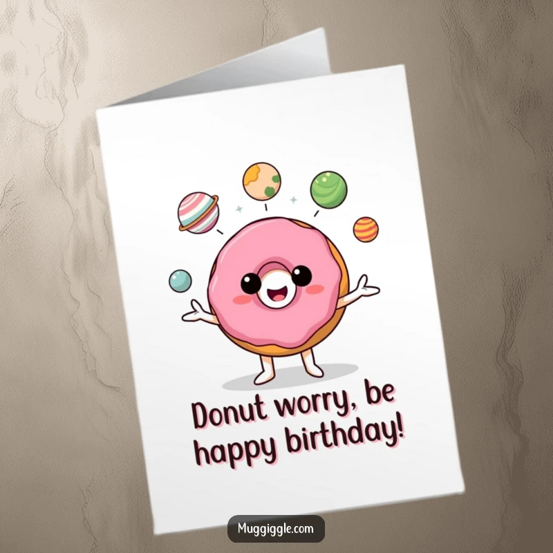 Funny Free Printable donut character joyfully juggling tiny planets, perfect for a humorous birthday card.