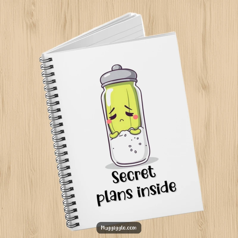 Funny anxious pickle character hiding behind a salt shaker on a notebook cover.