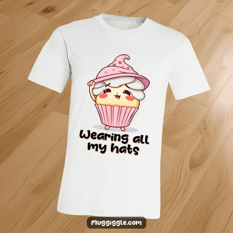 Funny t-shirt showcasing a cute, flustered cupcake character hilariously attempting to wear multiple hats at once.