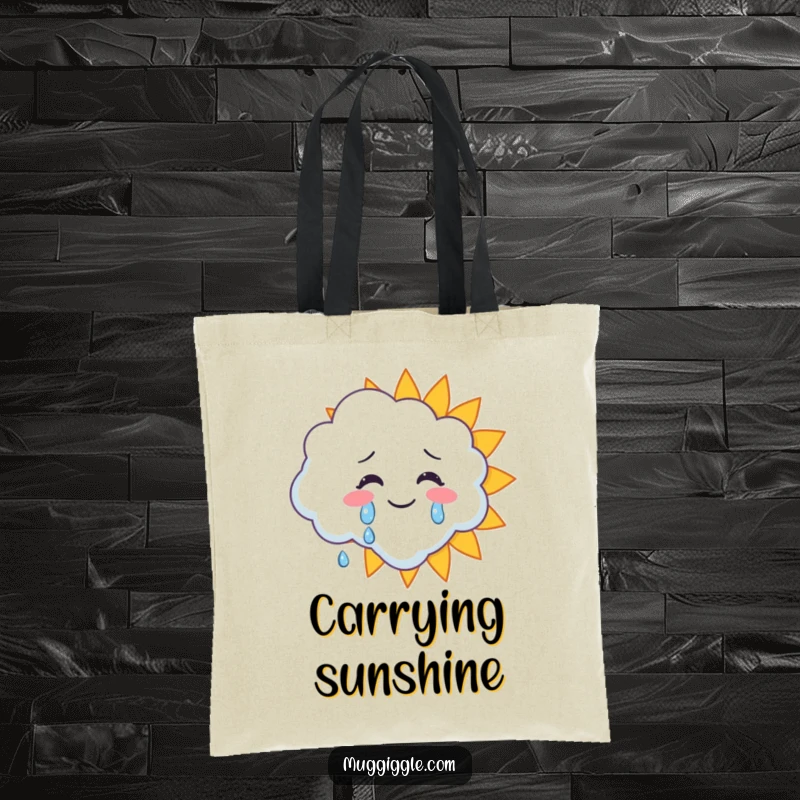 Funny tote bag with a cloud character crying happy tears onto a smiling sun, symbolizing radiant joy and positivity.